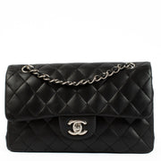 Chanel Black Lambskin Small Classic Bag with silver-tone hardware and turnlock closure, showcasing a smooth, elegant finish. Shop now on Labellov.com.