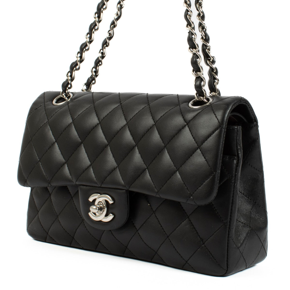 Chanel Black Lambskin Small Classic Bag with silver-tone hardware and turnlock closure, showcasing a smooth, elegant finish. Shop now on Labellov.com.