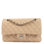 Discover the timeless elegance of the Chanel Beige Caviar Medium Classic 11.12 Bag. Crafted from durable caviar leather with gold-tone hardware, this iconic designer bag offers a perfect blend of luxury and practicality. Shop now on Labellov.com.