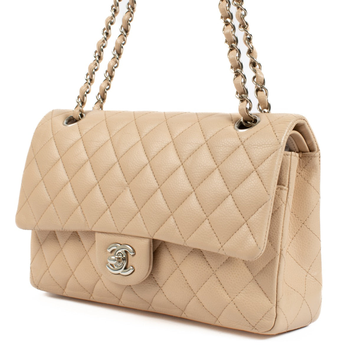 Discover the timeless elegance of the Chanel Beige Caviar Medium Classic 11.12 Bag. Crafted from durable caviar leather with gold-tone hardware, this iconic designer bag offers a perfect blend of luxury and practicality. Shop now on Labellov.com.