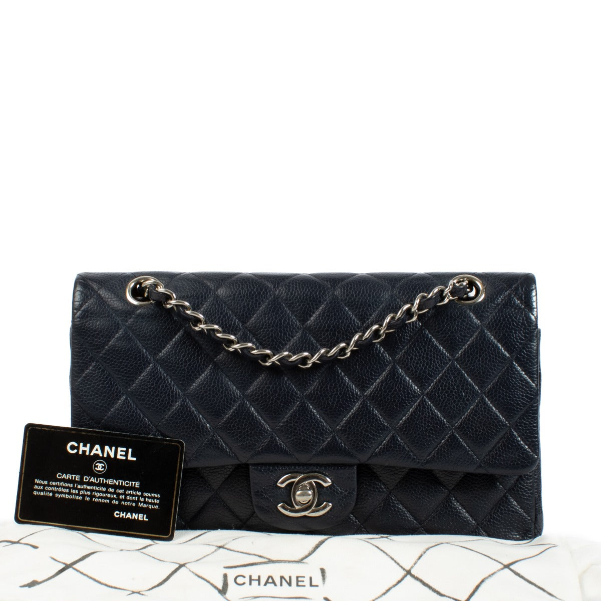 Chanel Navy Caviar Medium Classic 11.12 Bag with gold-tone hardware, quilted leather, and signature CC turn-lock closure. Elegant and versatile with a chain-link strap. Shop now on Labellov.com.