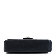 Chanel Navy Caviar Medium Classic 11.12 Bag with gold-tone hardware, quilted leather, and signature CC turn-lock closure. Elegant and versatile with a chain-link strap. Shop now on Labellov.com.