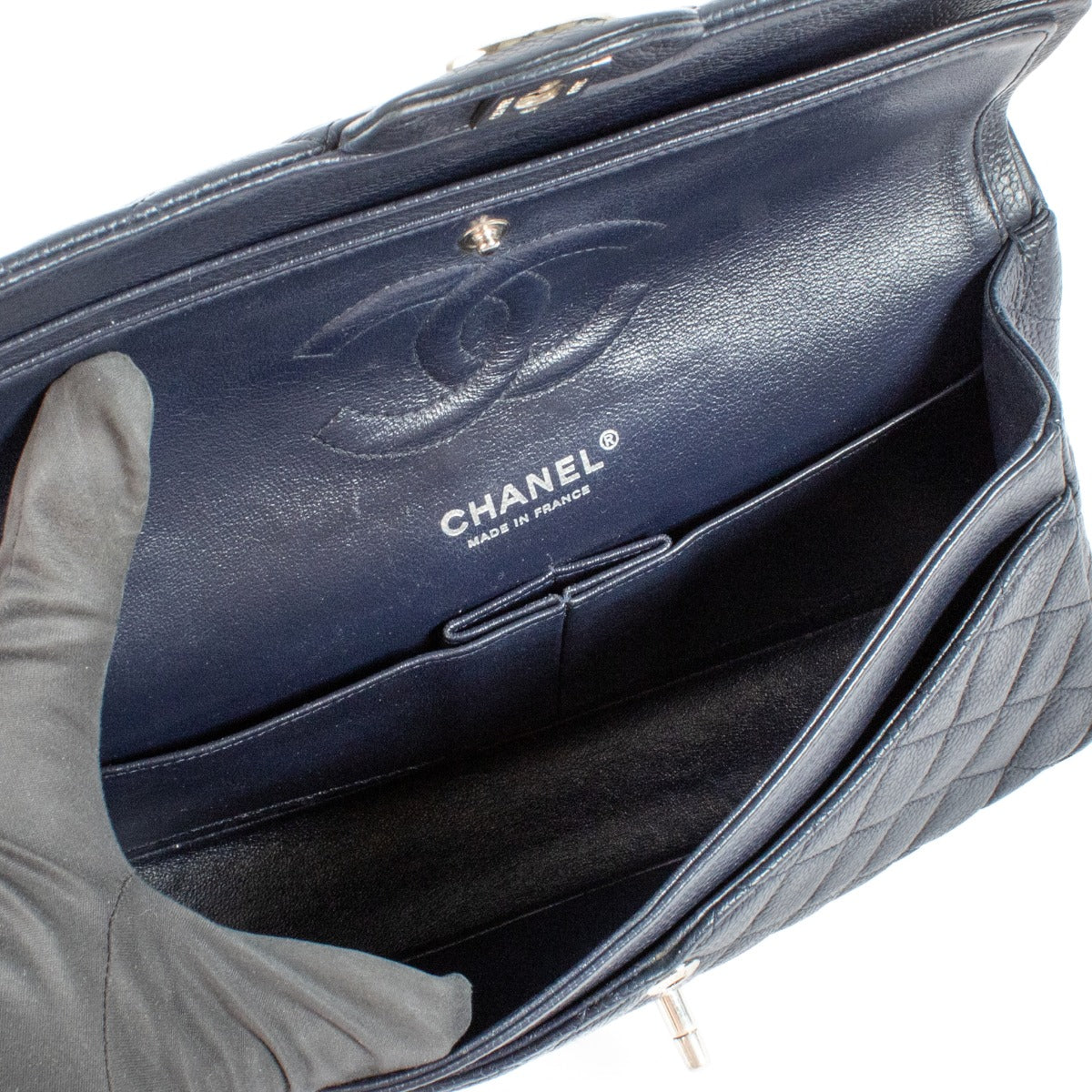 Chanel Navy Caviar Medium Classic 11.12 Bag with gold-tone hardware, quilted leather, and signature CC turn-lock closure. Elegant and versatile with a chain-link strap. Shop now on Labellov.com.