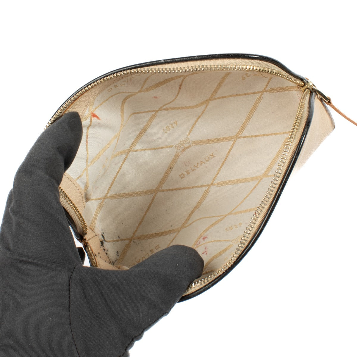 Shop at Labellov for the Delvaux Beige Pouch.