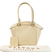Delvaux Beige Charme Bag with slight wear on straps, bottom, and interior, overall in very good condition. Order on Labellov.com.