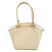 Delvaux Beige Charme Bag with slight wear on straps, bottom, and interior, overall in very good condition. Order on Labellov.com.