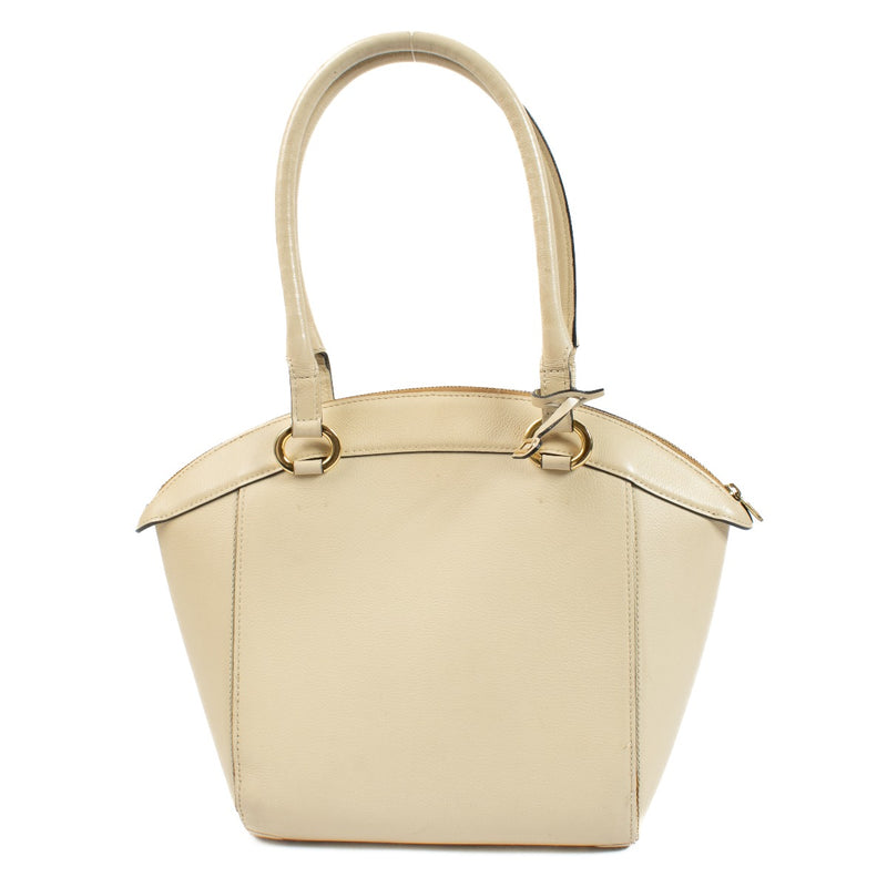 Delvaux Beige Charme Bag with slight wear on straps, bottom, and interior, overall in very good condition. Order on Labellov.com.