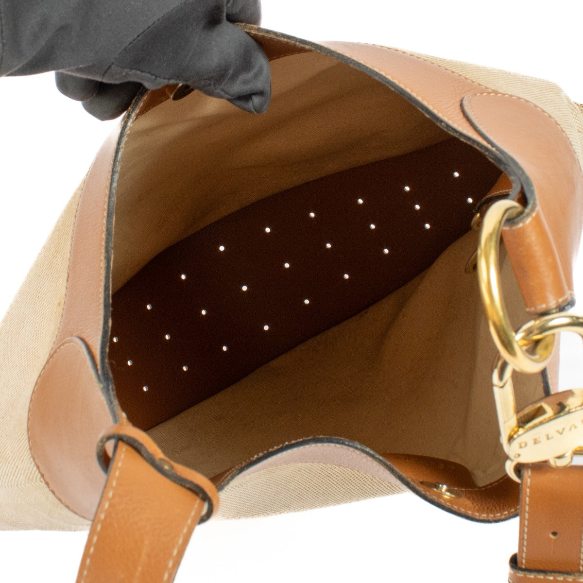 Elegant everyday bag with brown details, durable canvas, and gold hardware, perfect for carrying all your essentials now at Labellov.
