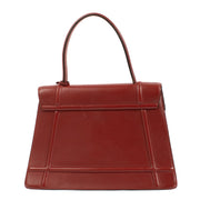 Delvaux Rosso Canter Saphir Bag in rich red leather with a structured silhouette, top handle, and gold-tone hardware. Stylish and functional for any occasion. Buy at Labellov.