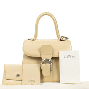 Shop safe online at Labellov in Antwerp, Brussels and Knokke this 100% authentic second hand Delvaux Ivoire Jumping PM Brillant. Veilig online tweedehands authentieke Delvaux Ivoire Jumping PM Brillant handtas kopen bij Labellov.