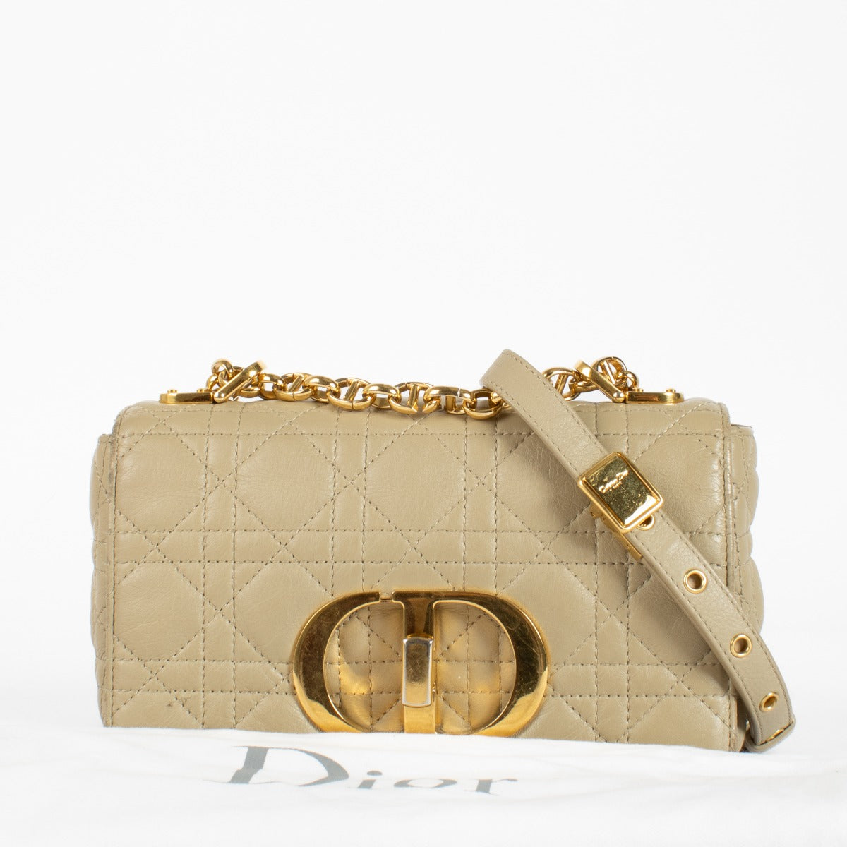 Shop the Christian Dior Beige Caro Crossbody, crafted in quilted calfskin leather with gold-tone CD hardware and the iconic 30 Montaigne detail. A timeless luxury handbag ideal for elegant everyday wear. Available now at Labellov.