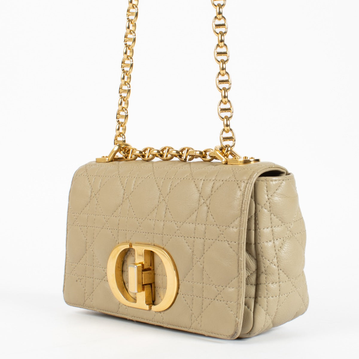 Shop the Christian Dior Beige Caro Crossbody, crafted in quilted calfskin leather with gold-tone CD hardware and the iconic 30 Montaigne detail. A timeless luxury handbag ideal for elegant everyday wear. Available now at Labellov.