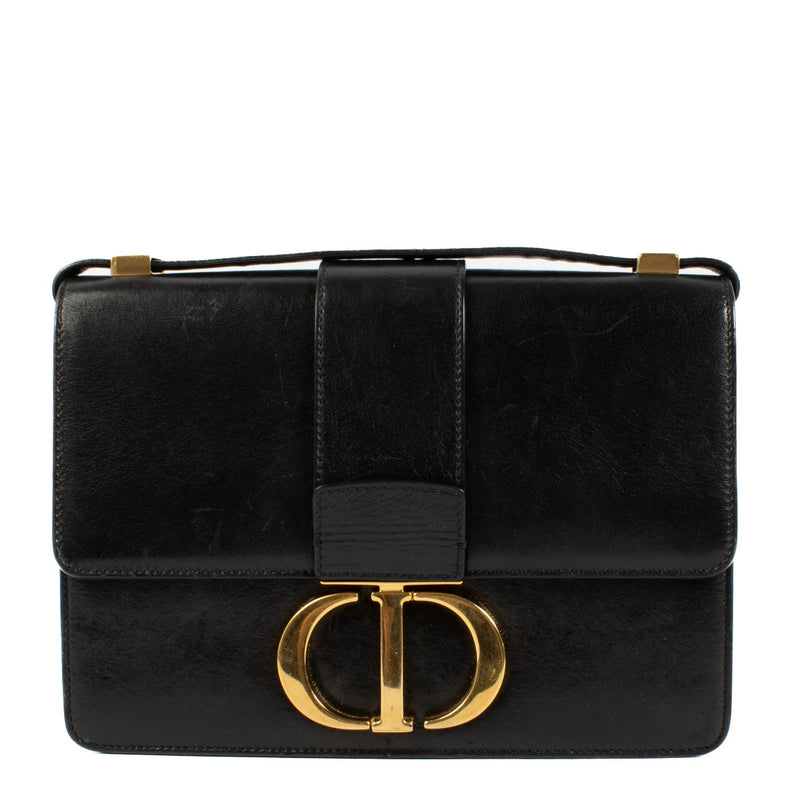 Shop safe online at Labellov in Antwerp, Brussels and Knokke this 100% authentic second hand Christian Dior Black Lambskin Montaigne 30. Veilig online tweedehands authentieke Christian Dior Black Lambskin Montaigne 30 handtas kopen bij Labellov.