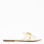 Shop pre-loved Christian Dior White Sandals featuring gold CD logo and smooth calfskin leather. A chic summer essential available now at Labellov, your trusted destination for luxury designer shoes in Antwerpen and Knokke.