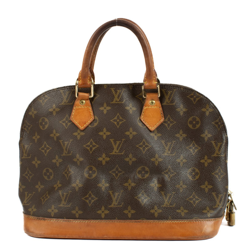 Louis Vuitton Vintage Monogram Alma PM bag with vachetta leather handles, showing signs of use and darkened patina. Classic structured silhouette with brass hardware. Shop at Labellov.