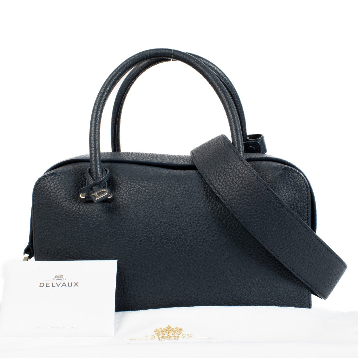 Delvaux Cool Box MM Navy Blue Taurillon Soft Bag in excellent condition, featuring supple navy blue leather, a zip-around closure, and a spacious interior, perfect for daily essentials.
