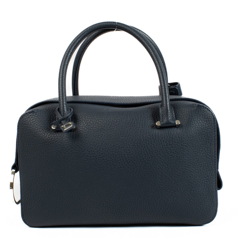 Delvaux Cool Box MM Navy Blue Taurillon Soft Bag in excellent condition, featuring supple navy blue leather, a zip-around closure, and a spacious interior, perfect for daily essentials.