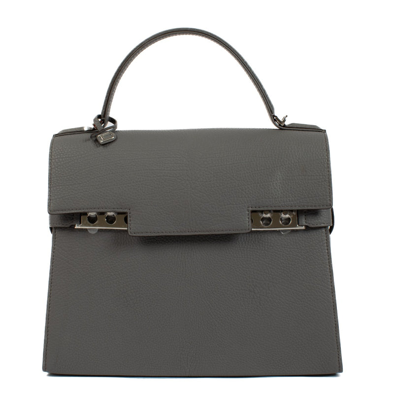 Delvaux Stone Crispy Calf Tempête MM bag in premium crispy calf leather, featuring a sophisticated stone hue, modern design, and versatile size with dust bag and extra strap. Shop now on Labellov.com.