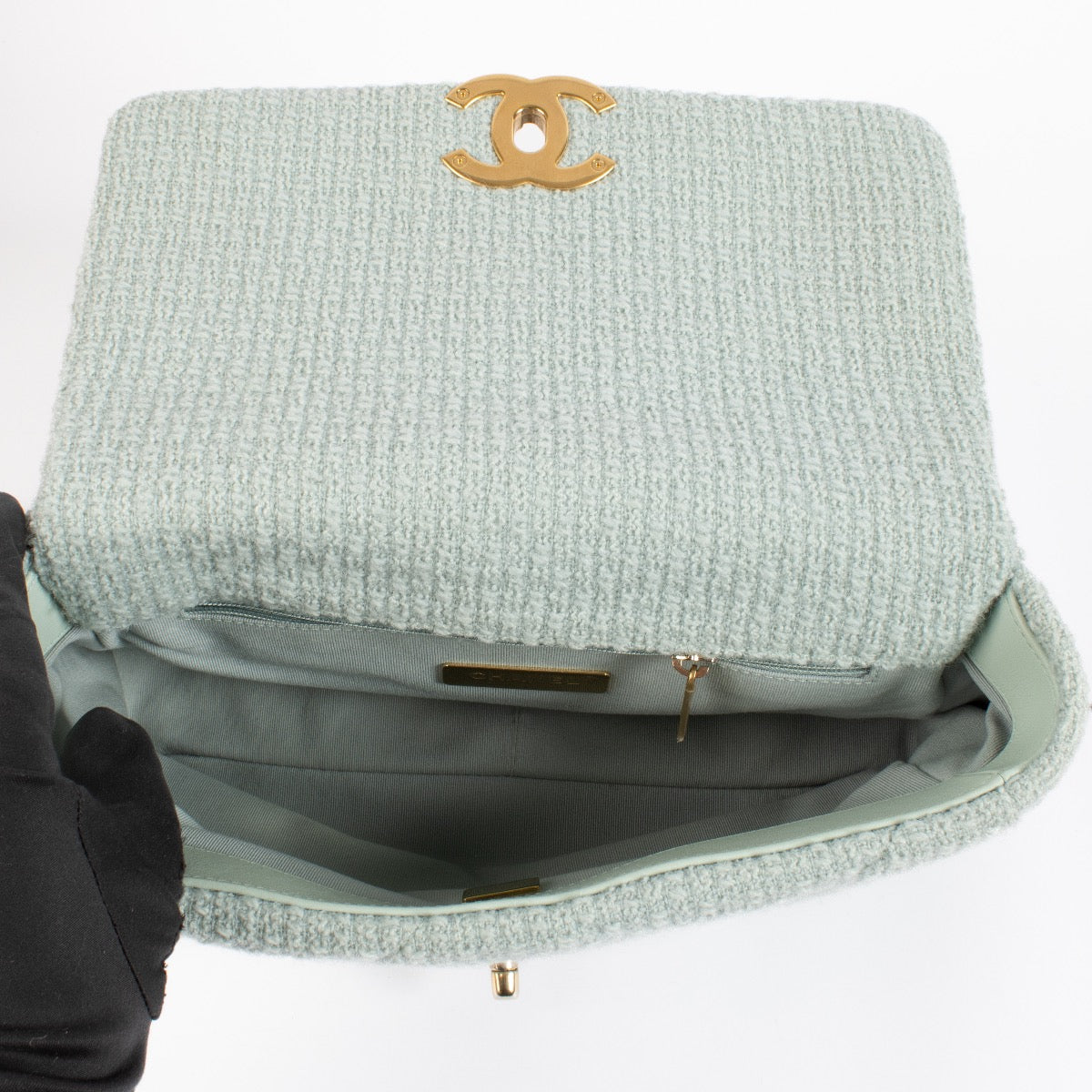 Shop safe online at Labellov in Antwerp, Brussels and Knokke this 100% authentic second hand Chanel Light Blue Tweed Medium Chanel 19 Bag