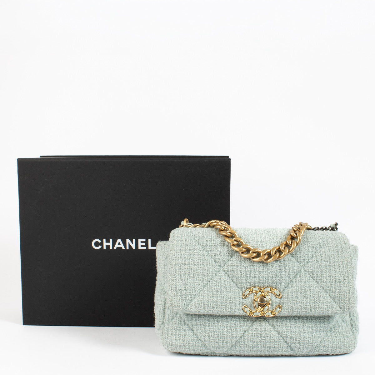 Shop safe online at Labellov in Antwerp, Brussels and Knokke this 100% authentic second hand Chanel Light Blue Tweed Medium Chanel 19 Bag