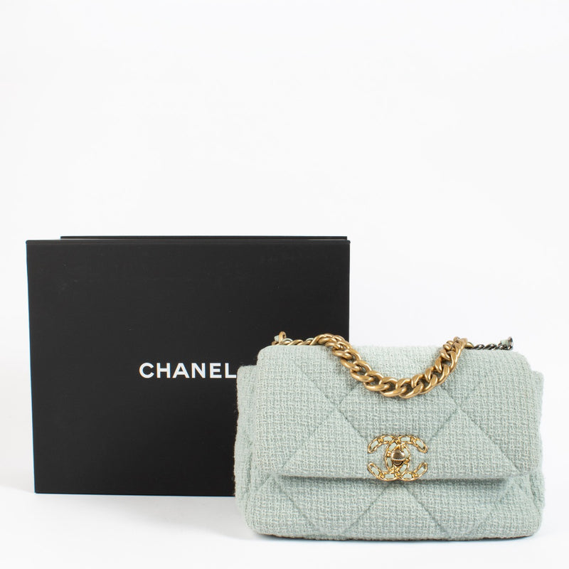 Shop safe online at Labellov in Antwerp, Brussels and Knokke this 100% authentic second hand Chanel Light Blue Tweed Medium Chanel 19 Bag