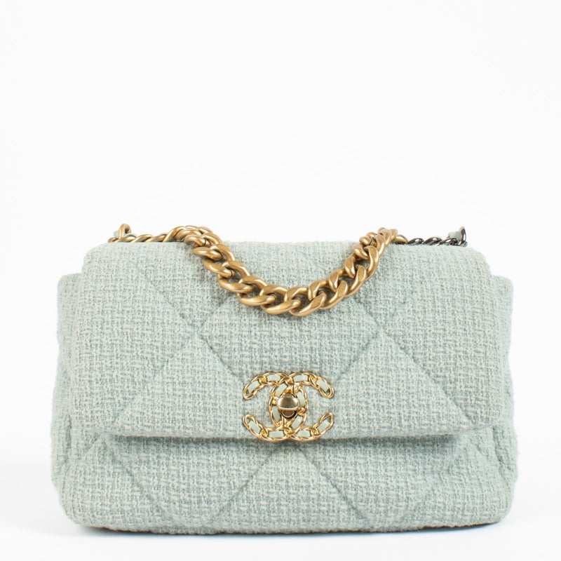 Shop safe online at Labellov in Antwerp, Brussels and Knokke this 100% authentic second hand Chanel Light Blue Tweed Medium Chanel 19 Bag