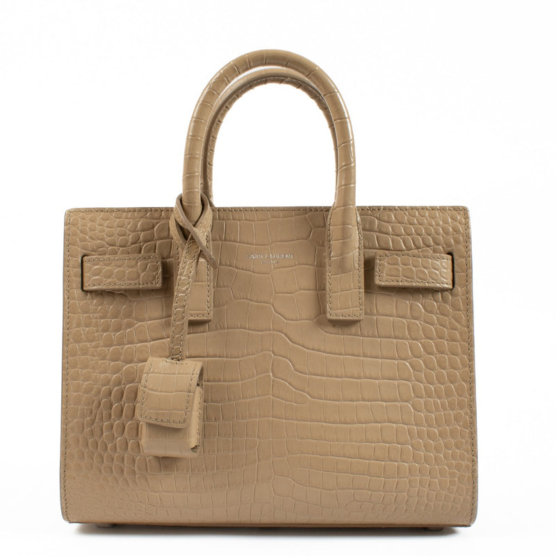 Are you looking for an authentic designer Saint Laurent Nano Sac De Jour Beige Crocodile Embossed Bag ? We buy and sell your preloved designer bags.