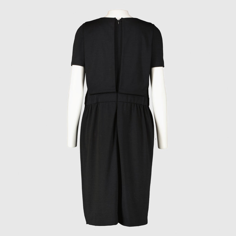 Authentic pre-loved Chanel 11A Black Wool Button Dress - Size 42 on Labellov.com