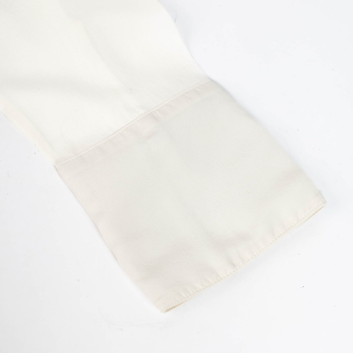 Authentic pre-loved Chanel Cream Silk Blouse - Size 40 on Labellov.com