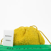 100% authentic preloved Bottega Veneta Yellow Raffia Mini Pouch on labellov.com