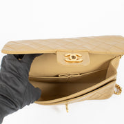 Shop safe online at Labellov in Antwerp and Knokke this 100% authentic second hand Chanel Vintage Beige Lambskin Medium Classic Flap Bag