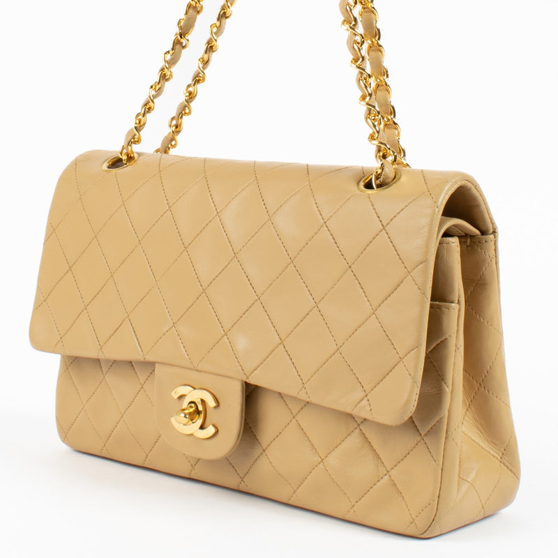 Shop safe online at Labellov in Antwerp and Knokke this 100% authentic second hand Chanel Vintage Beige Lambskin Medium Classic Flap Bag