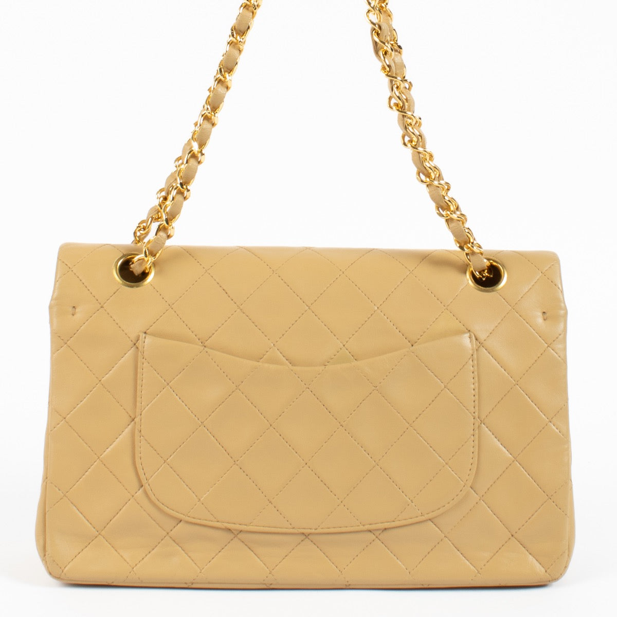 Shop safe online at Labellov in Antwerp and Knokke this 100% authentic second hand Chanel Vintage Beige Lambskin Medium Classic Flap Bag
