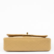 Shop safe online at Labellov in Antwerp and Knokke this 100% authentic second hand Chanel Vintage Beige Lambskin Medium Classic Flap Bag