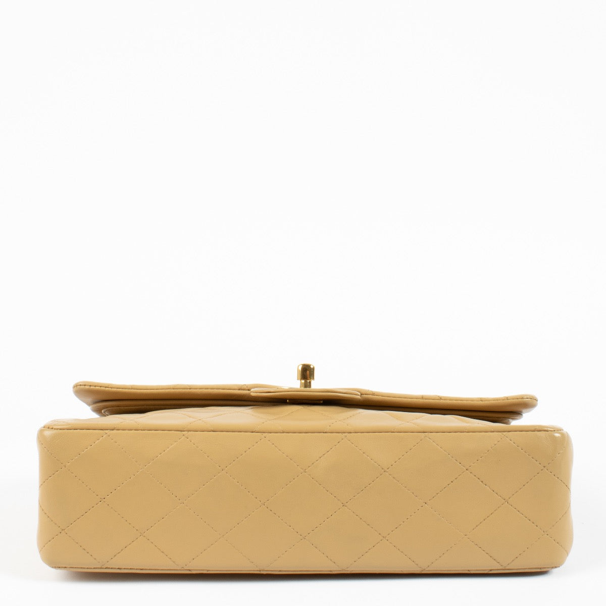 Shop safe online at Labellov in Antwerp and Knokke this 100% authentic second hand Chanel Vintage Beige Lambskin Medium Classic Flap Bag