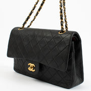 Authentic second hand Chanel Vintage Black Lambskin Medium Classic Flap Bag on Labellov.com