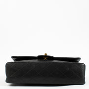 Authentic second hand Chanel Vintage Black Lambskin Medium Classic Flap Bag on Labellov.com