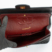 Authentic second hand Chanel Vintage Black Lambskin Medium Classic Flap Bag on Labellov.com