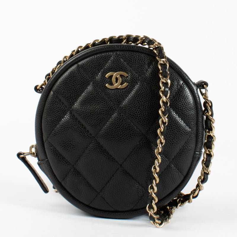 Petite yet unmistakably powerful, the Chanel Round Classic Clutch with Chain is a playful reinterpretation of the House’s most beloved codes. Crafted from luxurious black caviar leather, this circular silhouette features Chanel’s iconic diamond quilting a