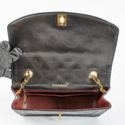 Authentic pre-loved Chanel Black Medium Diana Flap Bag on Labellov.com