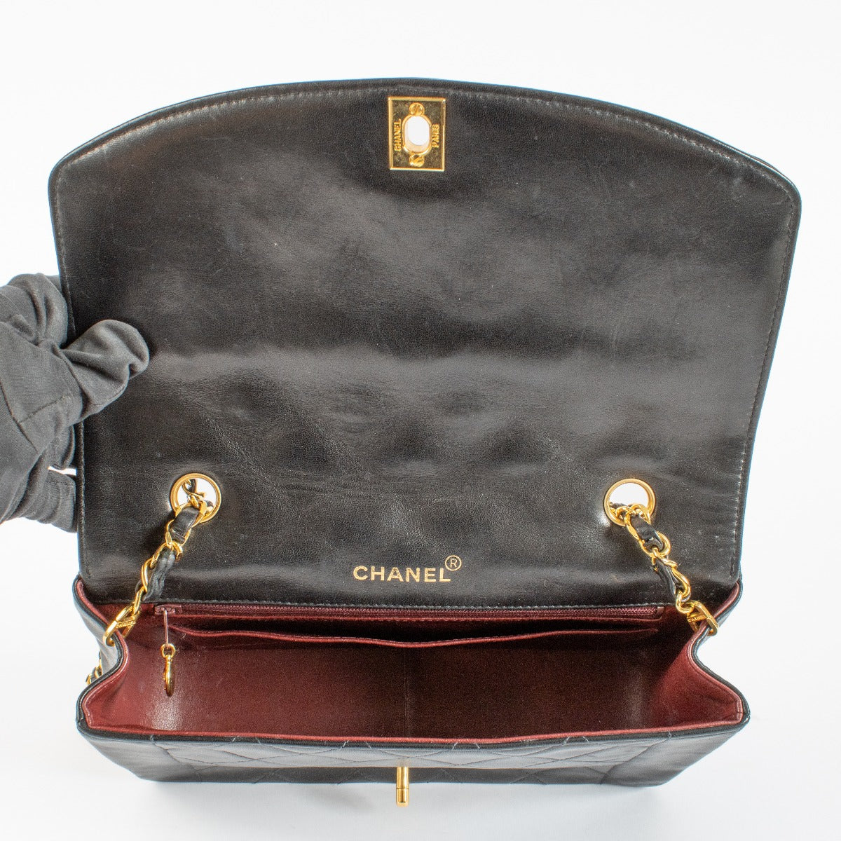 Authentic pre-loved Chanel Black Medium Diana Flap Bag on Labellov.com