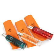 Hermès set of 3 travel perfumes, featuring 15ml bottles of Eau de Rhubarbe Écarlate, Eau de Cologne, and Eau d'Orange Verte, offering refreshing and vibrant fragrances in a compact, travel-friendly design. Shop now at Labellov.