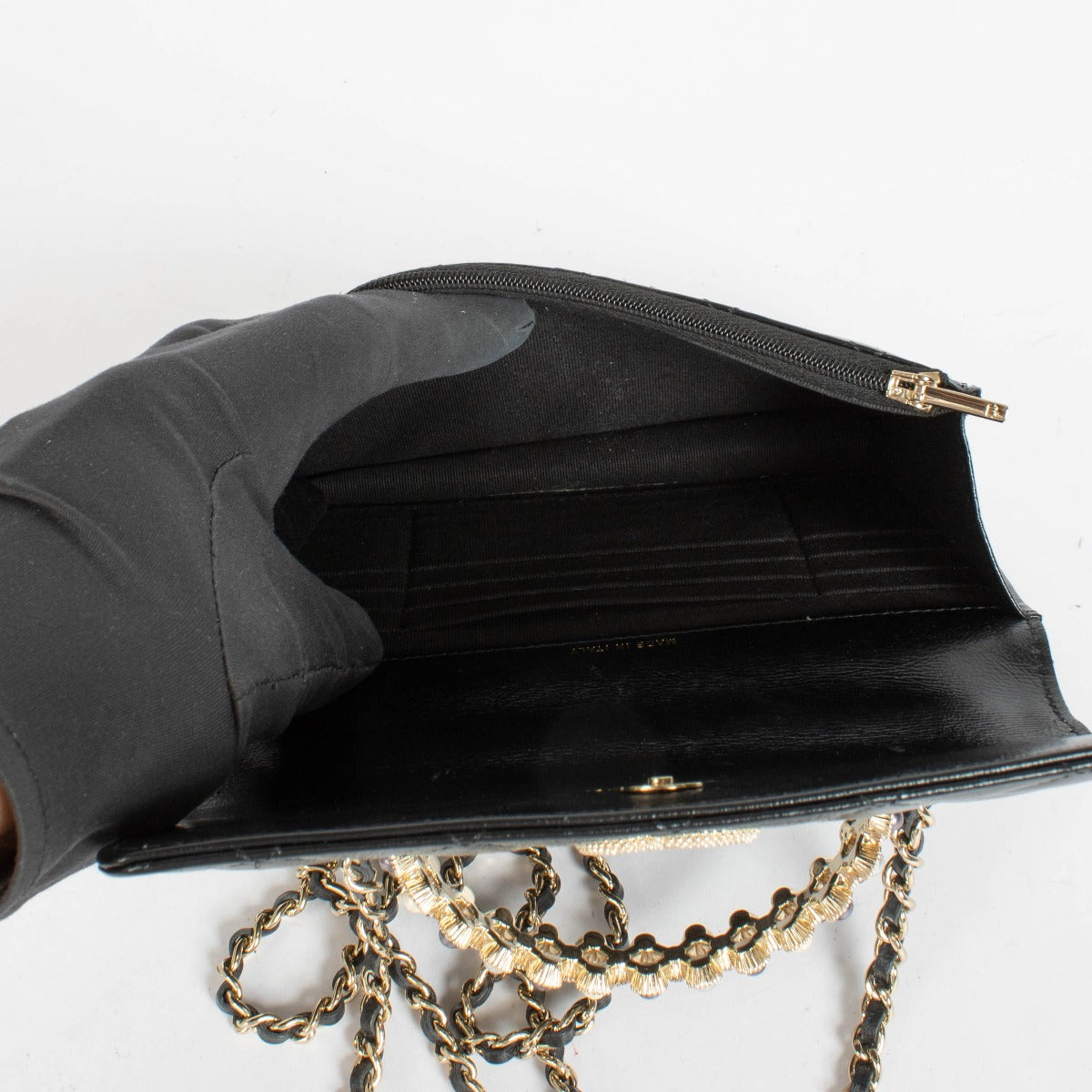 Authentic pre-loved Chanel Black Lambskin Pearl Top Handle Clutch With Chain on Labellov.com