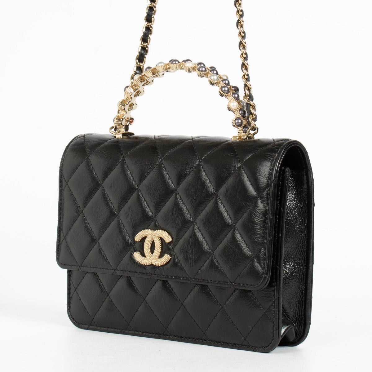 Authentic pre-loved Chanel Black Lambskin Pearl Top Handle Clutch With Chain on Labellov.com