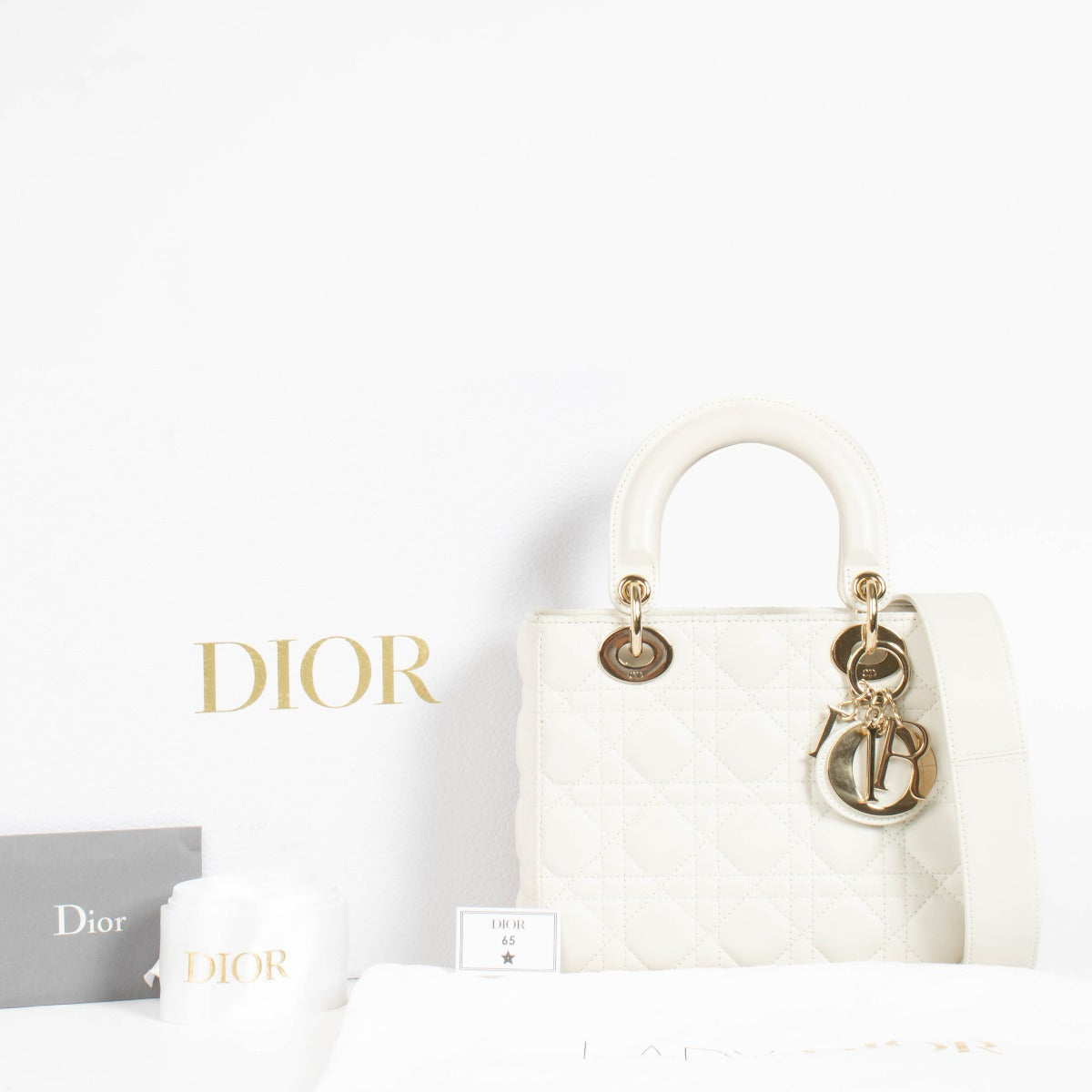 Authentic pre-loved Christian Dior White Small Lady Dior Bag on Labellov.com