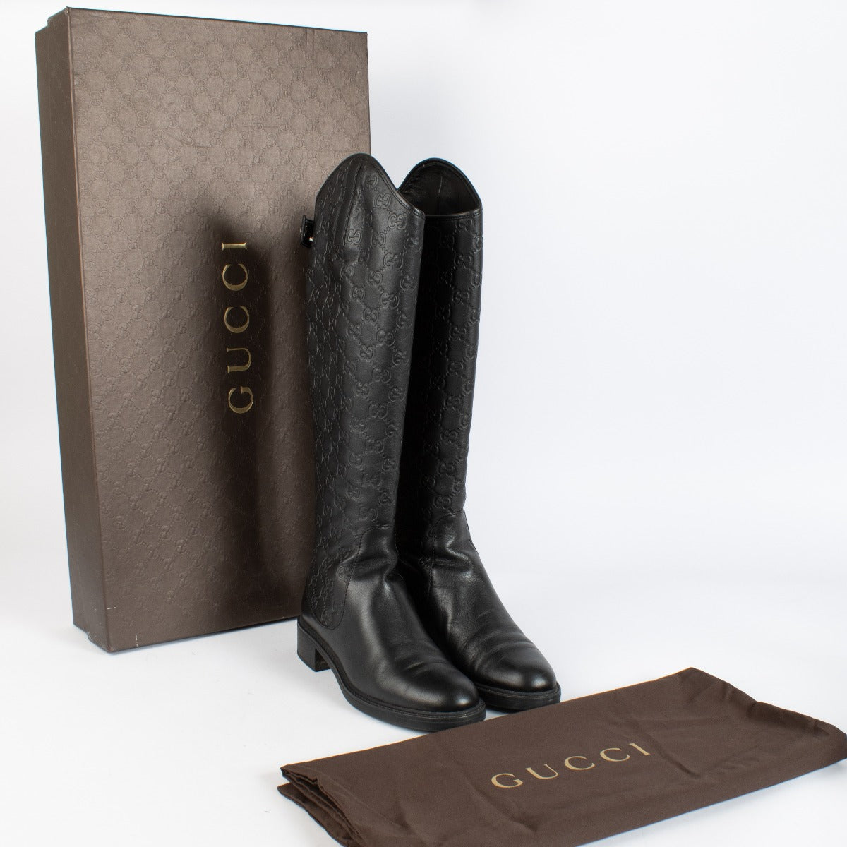 Authentic preloved Gucci Black Leather Monogram Boots on Labellov.com