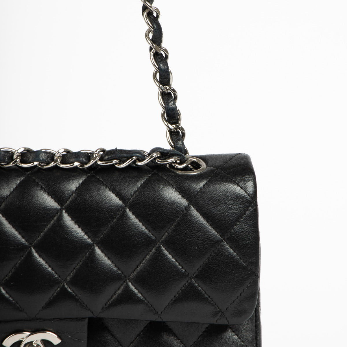 Shop this 100% authentic Chanel Black Lambskin Small Classic Handbag at Labellov.com