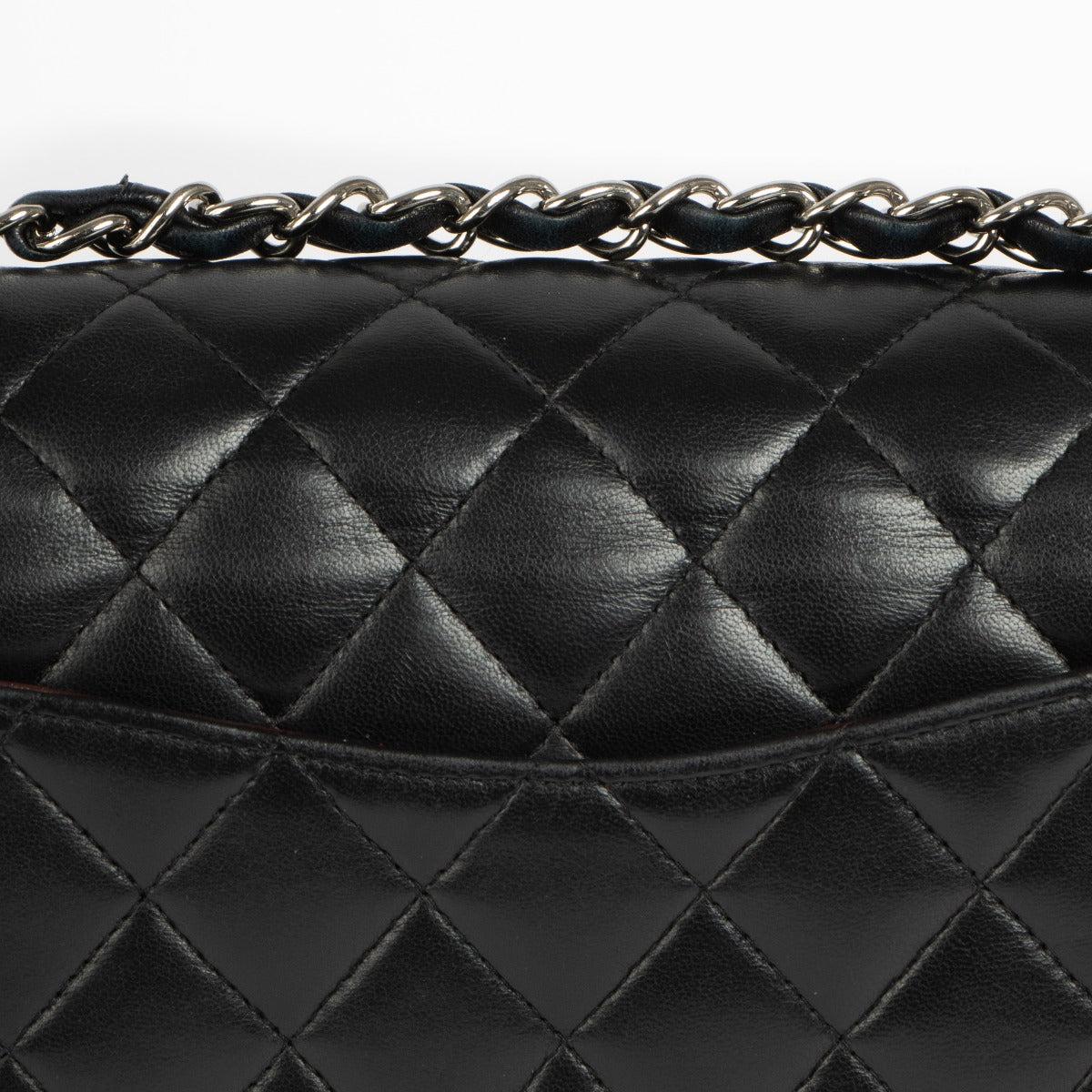 Shop this 100% authentic Chanel Black Lambskin Small Classic Handbag at Labellov.com