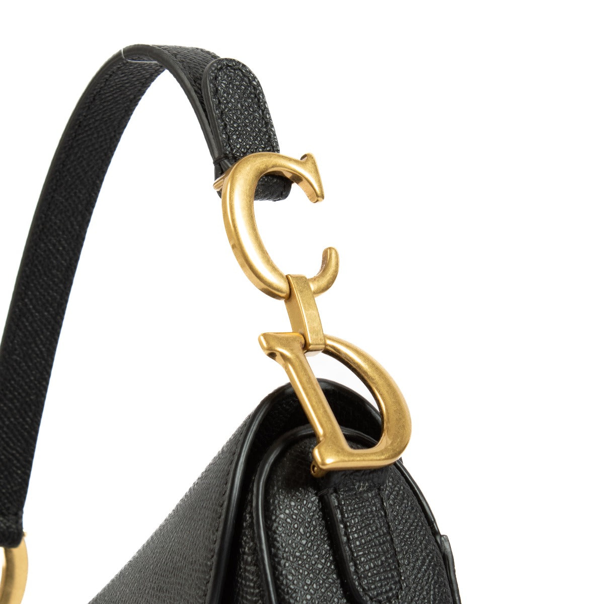 The Dior Black Leather Mini Saddle Bag is a timeless, compact luxury piece in very good condition. Crafted from black leather with gold-tone hardware, it features minimal signs of wear and a versatile strap for effortless styling. Shop now on Labellov.com