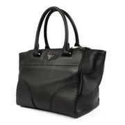 Prada Black City Calf Handbag in luxurious black calf leather, featuring a minimalist design, top handles, adjustable shoulder strap, and spacious interior. Shop now on Labellov.com.
